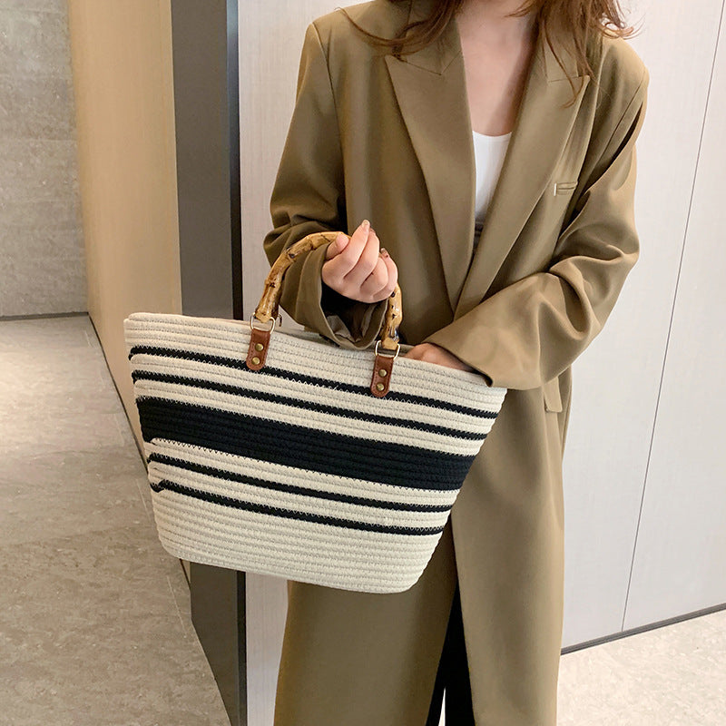 “Eco-Friendly Women’s Bamboo Handbag with Black Stripe Detail - Stylish and Sustainable”
