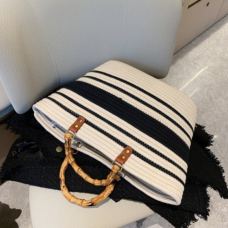 “Eco-Friendly Women’s Bamboo Handbag with Black Stripe Detail - Stylish and Sustainable”